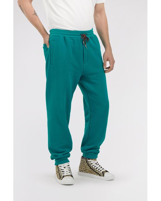 Roberto Cavalli Green Trousers With Fang Detail for men