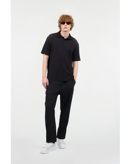 Roberto Cavalli Black Polo Shirt With Monogram And Lettering for men