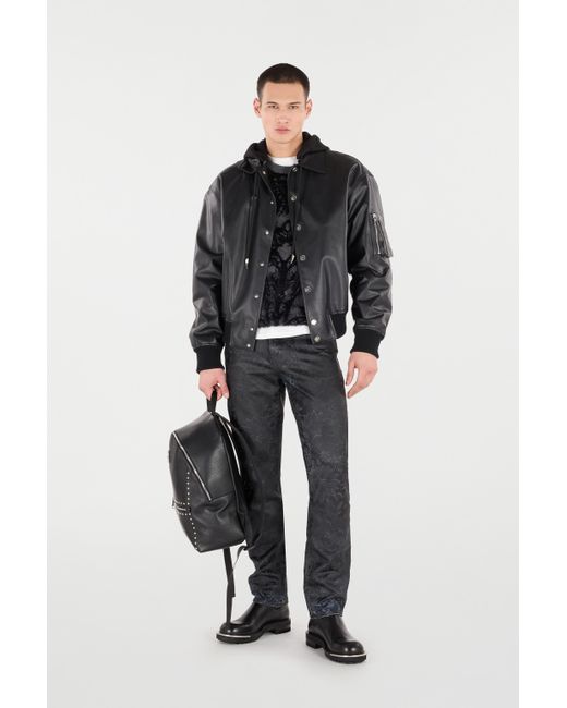 Roberto Cavalli Black Jeans With Floral Pattern And Discoloration for men