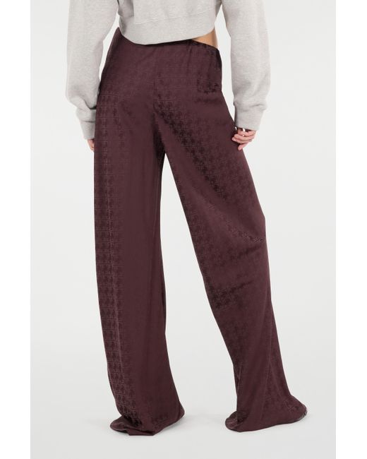 Pantaloni Loose Con Monogram Mirror Snake di Roberto Cavalli in Purple