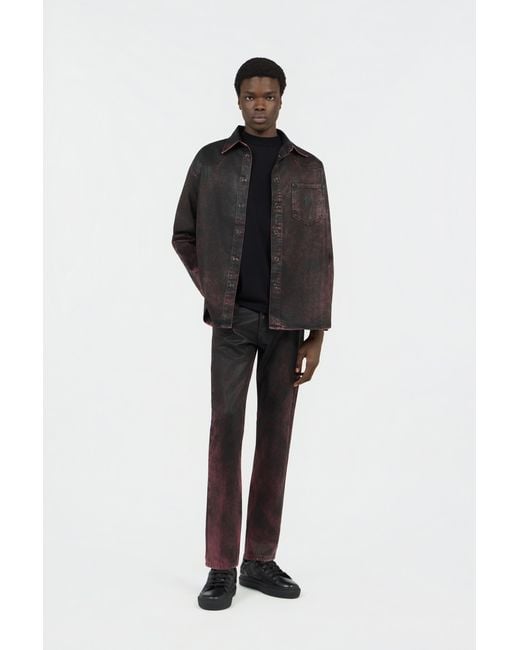 Roberto Cavalli Black Washed-Effect Coated Jeans for men