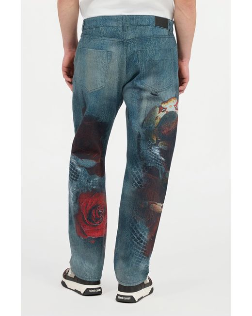 Roberto Cavalli Blue Jeans With Rose And Snake Print for men