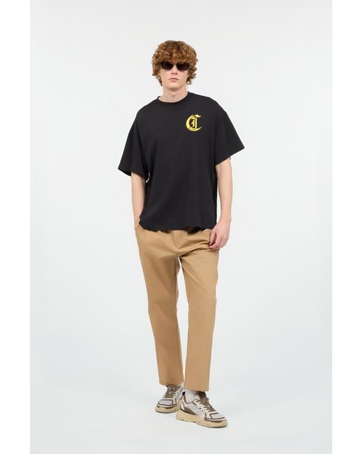 Roberto Cavalli Black T-Shirt With Floral And Tropical Bird Print for men