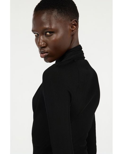 Pull Cache-Cœur Roberto Cavalli en coloris Black