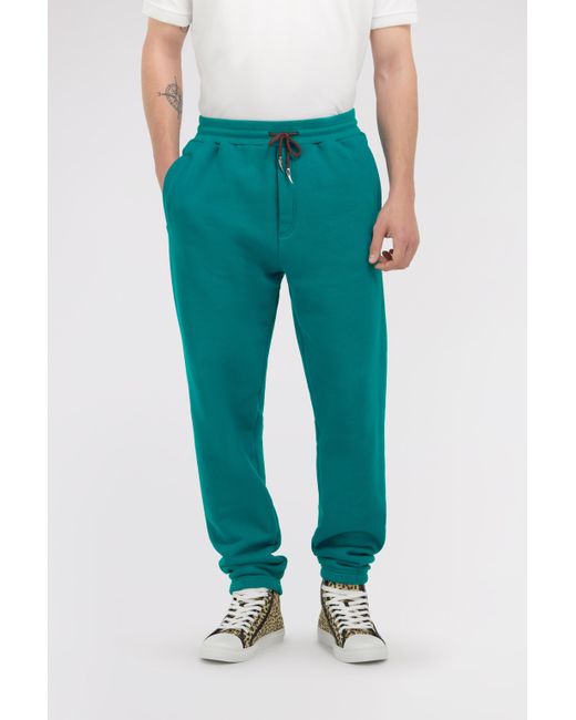 Roberto Cavalli Green Trousers With Fang Detail for men