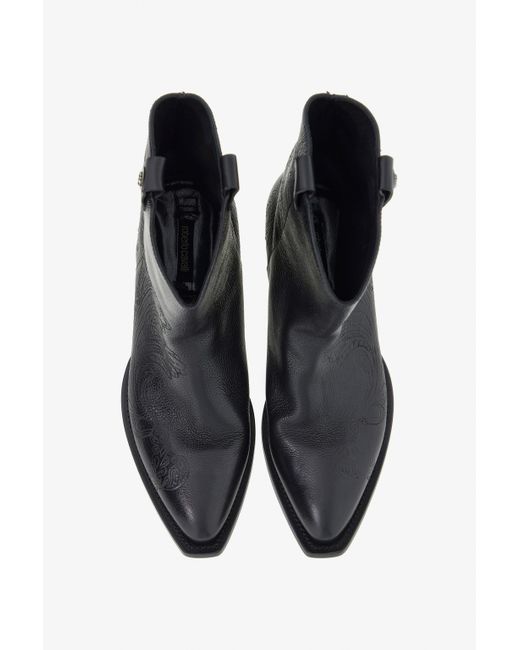 Roberto Cavalli Black Textano Boots With Fang Detail for men