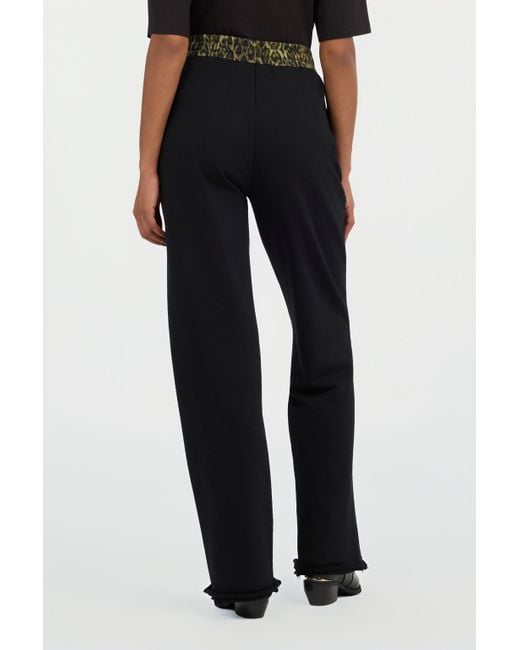 Roberto Cavalli Black Flared Trousers With Leopard Print Waistband