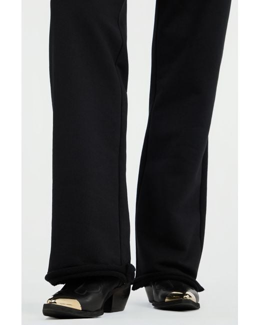 Roberto Cavalli Black Flared Trousers With Leopard Print Waistband