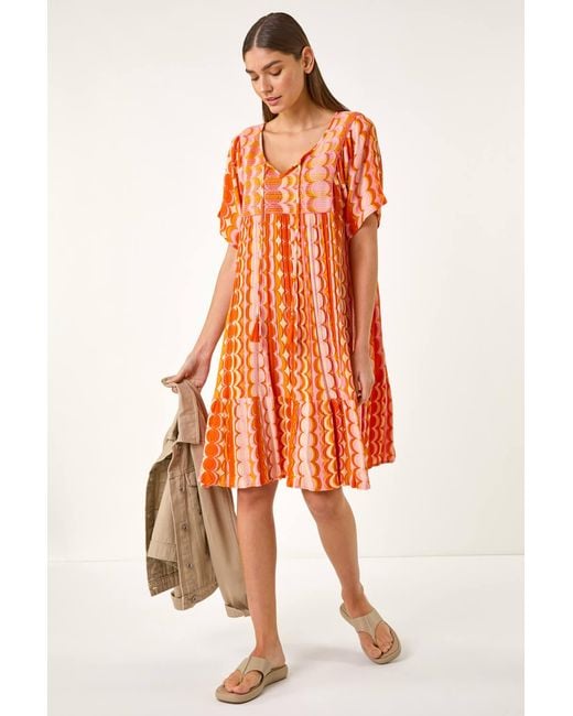 Roman Orange Abstract Smocked Dress