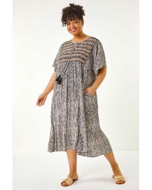 Roman Curve Gray Tassel Trim Printed Dress