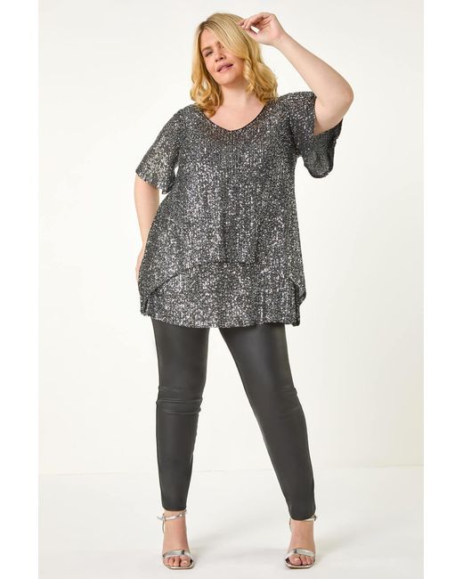 Roman Curve Gray Sequin Overlay Flute Sleeve Top