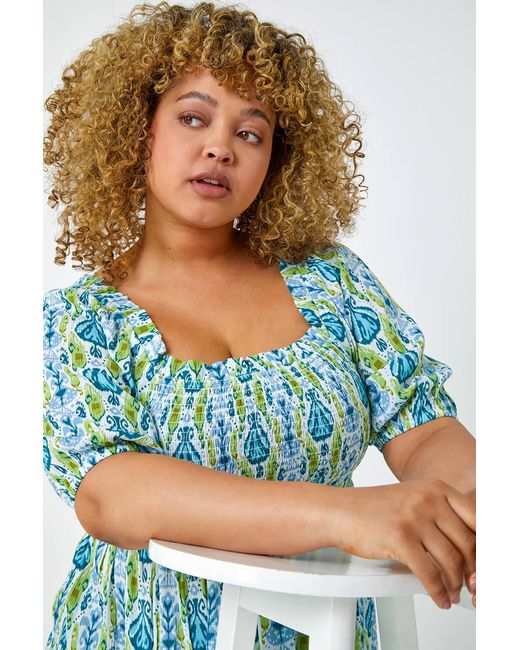 Roman Curve Blue Aztec Print Shirred Peplum Top