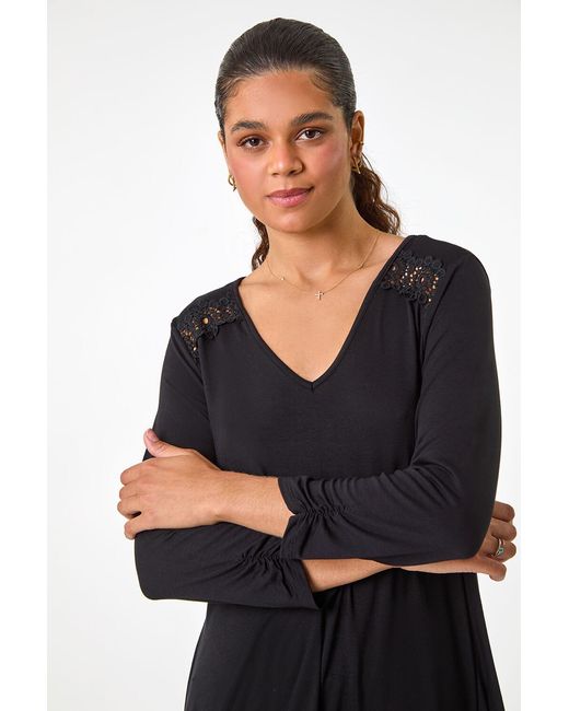 Roman Black Floral Crochet Trim Tunic Top