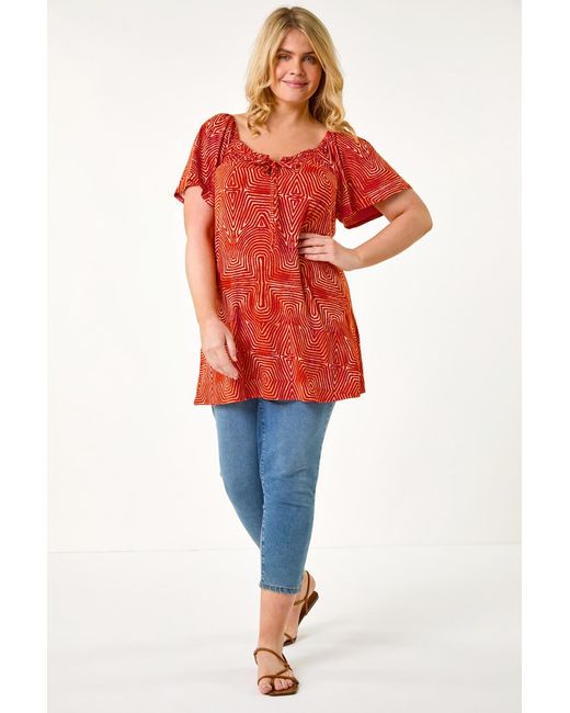 Roman Curve Orange Tie Front Abstract Stretch Top