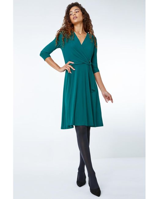 Roman Blue Ring Buckle Wrap Stretch Dress