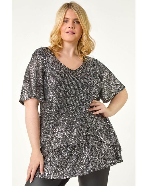 Roman Curve Gray Sequin Overlay Flute Sleeve Top