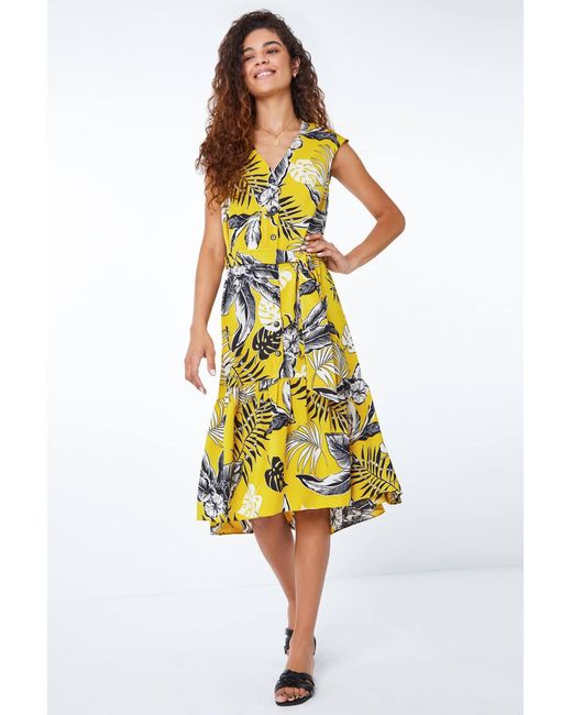 Roman Yellow Tropical Print Dipped Hem Dress