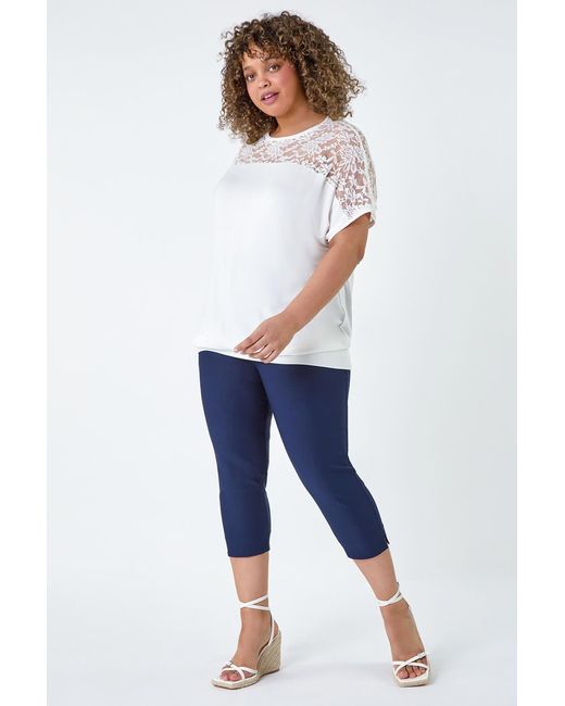 Roman Curve White Lace Yoke Stretch Bubble Hem Top