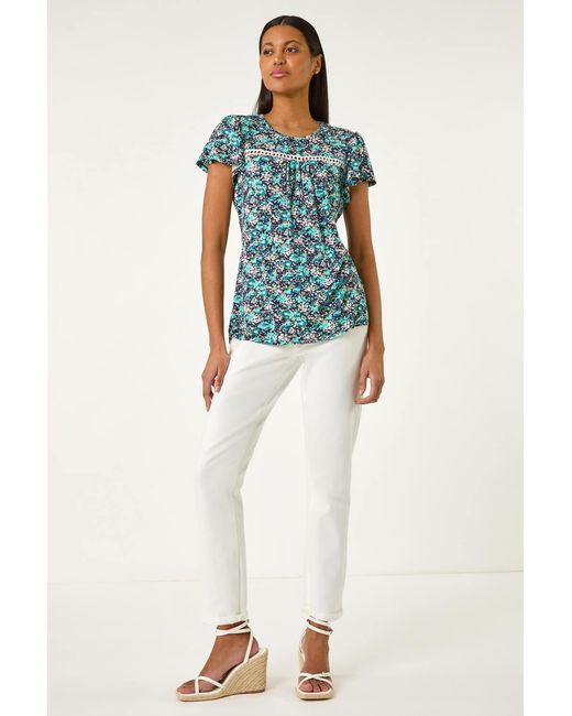 Roman Blue Floral Print Ladder Trim Stretch Top