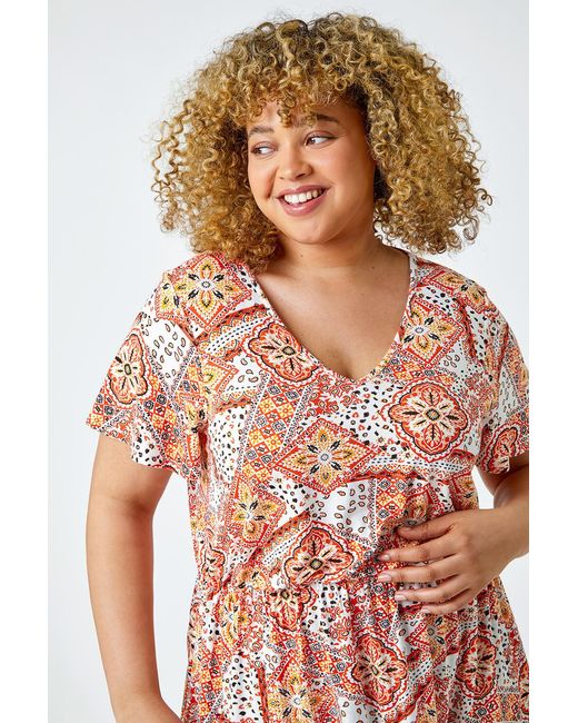 Roman Curve Red Geometric Print V-Neck Stretch Top