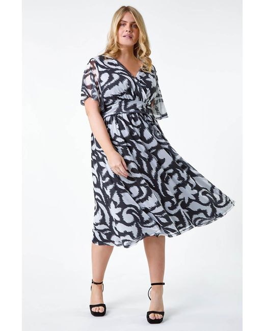 Roman Curve Blue Abstract Stretch Mesh Wrap Dress