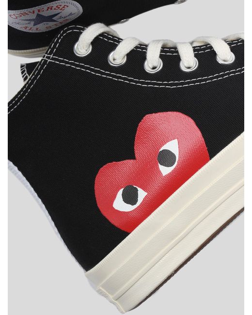 black converse with heart