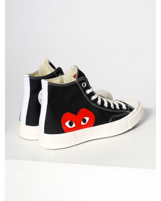 converse shoes with red heart