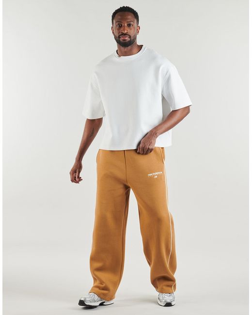 New Balance Natural Tracksuit Bottoms Linear Graphic Fleece Pant for men