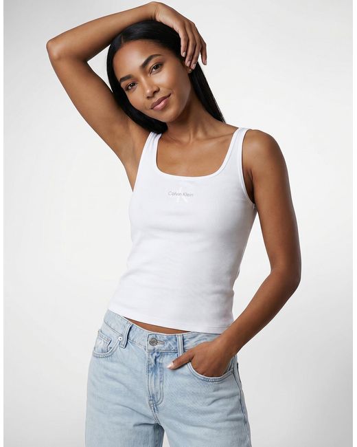 Calvin Klein White Tops / Sleeveless T-shirts Monologo Scoop Nk Rib Tanktop