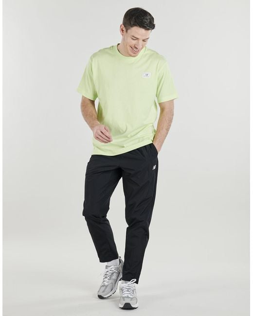 New Balance Blue Tracksuit Bottoms Utility Woven Pant for men
