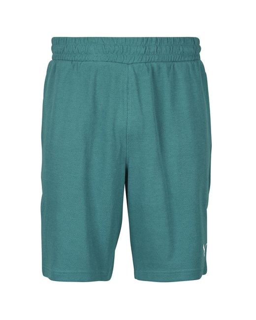 PUMA Green Shorts Ess Elevated Relaxed Shorts 9' for men
