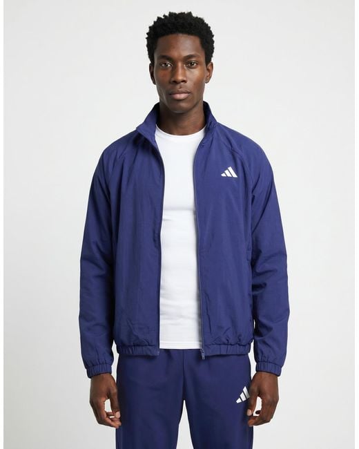 Adidas Blue Technical Jackets Essential Small Logo Windbreaker for men