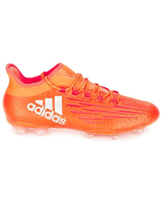 orange football boots adidas