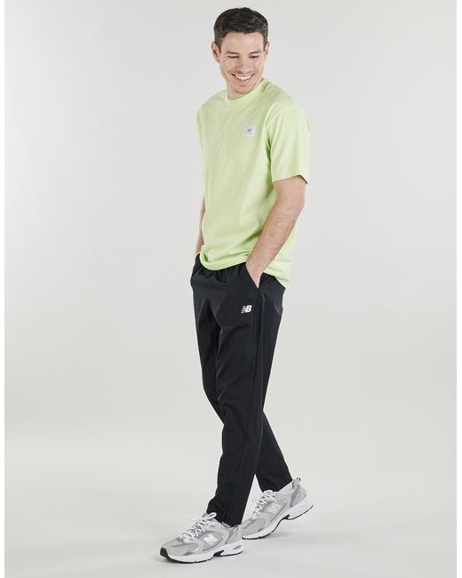 New Balance Blue Tracksuit Bottoms Utility Woven Pant for men