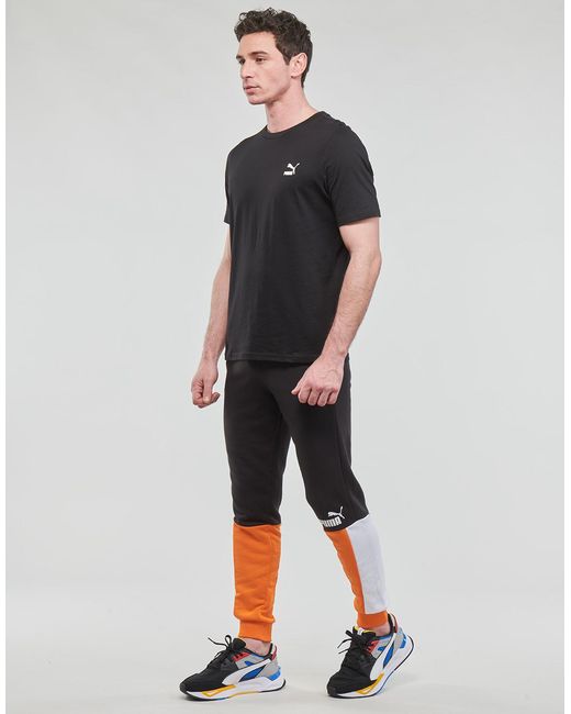 PUMA Black Tracksuit Bottoms Ess+ Block Sweatpant Tr for men