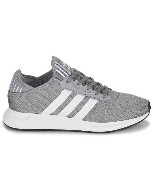 gray adidas trainers