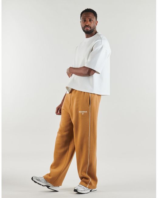 New Balance Natural Tracksuit Bottoms Linear Graphic Fleece Pant for men