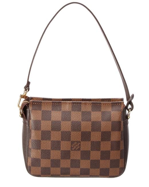 Louis Vuitton, makeup bag and wallet. - Bukowskis