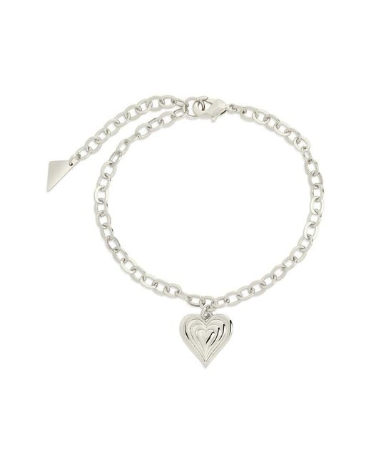 Sterling Forever White Rhodium Plated Beating Heart Charm Bracelet
