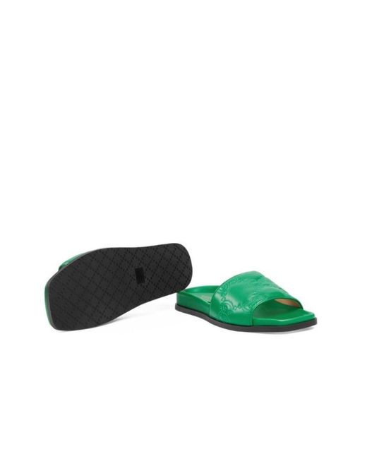Gucci Gg Matelassé Slide Sandal In Green