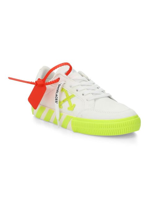 off white canvas low top sneakers