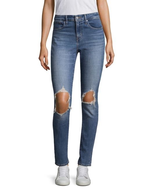Lyst Levi's 721 High Rise Ripped Skinny Jeans in Blue