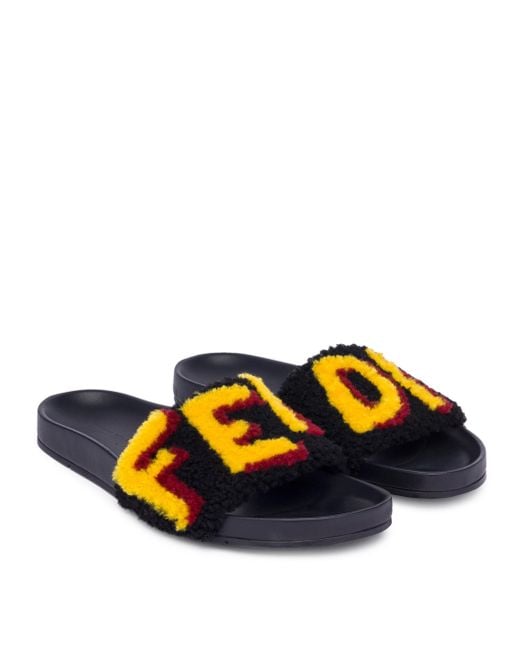 Fendi monster shop slides