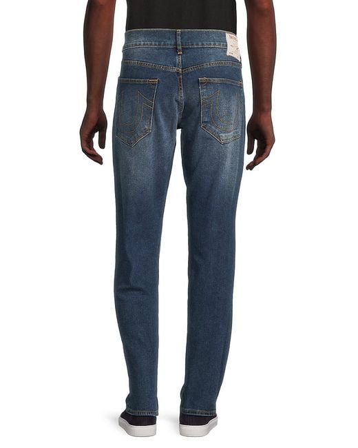 True Religion Blue Geno Slim Fit Dark Wash Jeans for men