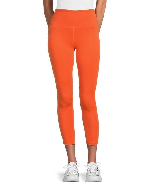 Beyond Yoga Orange Powerbeyond Leggings