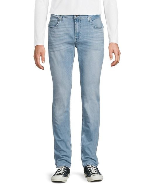 7 For All Mankind Blue Paxtyn Faded Stretch Skinny Jeans for men