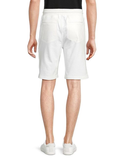 Brunello Cucinelli White Solid Drawstring Flat Front Shorts for men