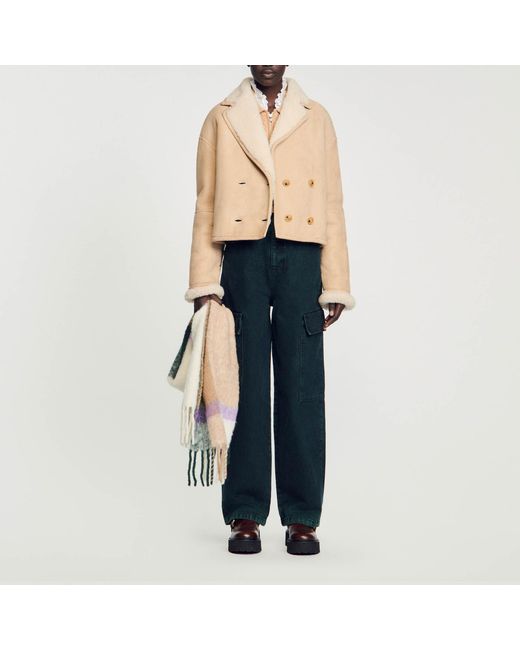 Manteau court peau lainee Sandro en coloris Bleu Lyst