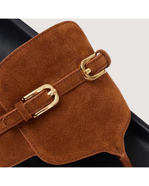 Sandales en cuir suède à boucles Sandro en coloris Brown