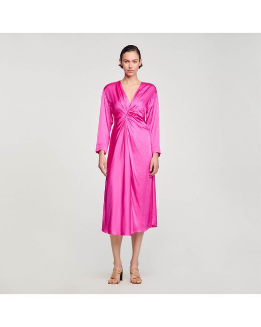 Robe longue drapée Sandro en coloris Pink